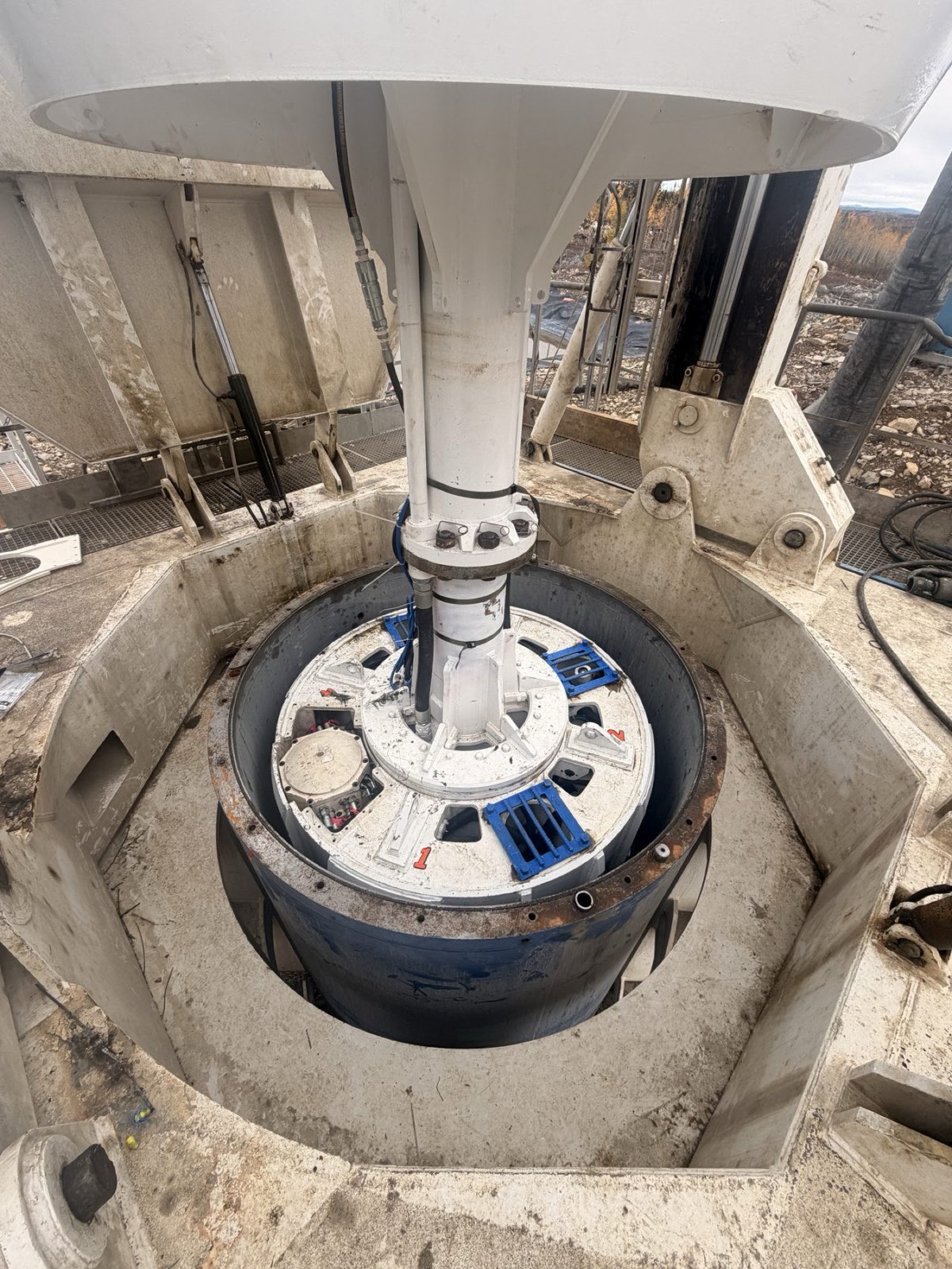 Cutting head of the surgical mining drill at the collar of the hole